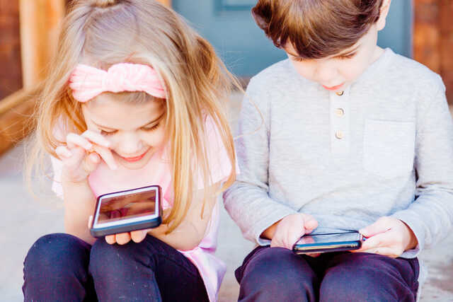 kids playing with phones