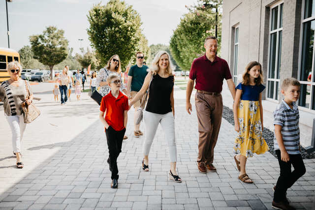 Family walking into church
